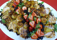Deliecious Display of Grilled Chicken, Scallops, Pineapple on Greens